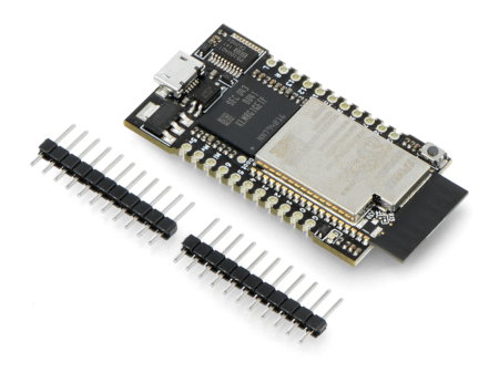 Płytka rozwojowa SparkFun leży na białym tle wraz z elementami zestawu.